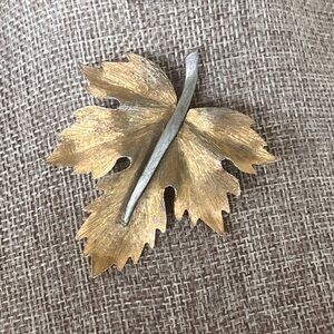 Elegant Gold and Silver Leaf Brooch